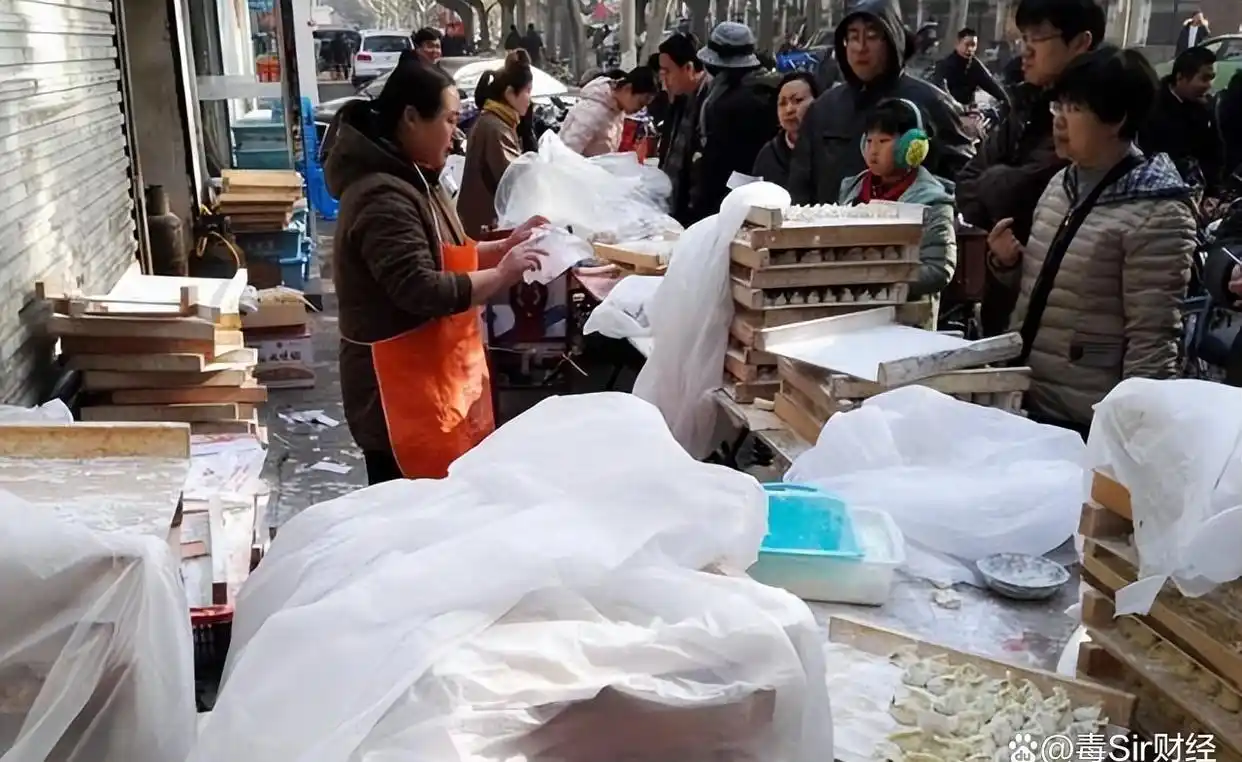 春联摆摊利润分析_过去零元的代理致富好买卖_春节街边小买卖赚钱